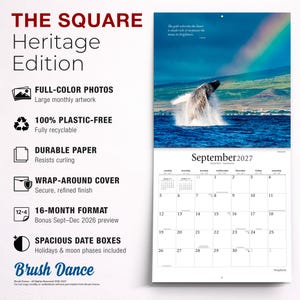 May include: A 16-month wall calendar titled The Square Heritage Edition by Brush Dance. The top page features a humpback whale breaching in the ocean with a rainbow above. The bottom page displays the September 2027 calendar grid with date boxes.