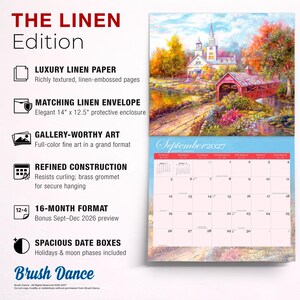 May include: A 16-month wall calendar titled THE LINEN Edition, featuring a colourful landscape painting of a church and covered bridge. The calendar includes a 35.56 cm by 31.75 cm linen envelope, textured linen-embossed pages, and a brass grommet.