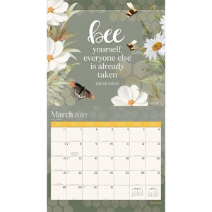 May include: A March 2021 wall calendar featuring a sage green background with a honeycomb pattern, white flowers, bees, and a butterfly. The text reads: bee yourself, everyone else is already taken, Oscar Wilde. The grid displays dates for March 2021.