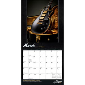 May include: A wall calendar for March 2021 featuring a black electric guitar with gold hardware resting in an open hardshell case. The calendar grid displays the days of the month, and the bottom text identifies the instrument as an Epiphone Joe Bonamassa Black Beauty Les Paul Custom.
