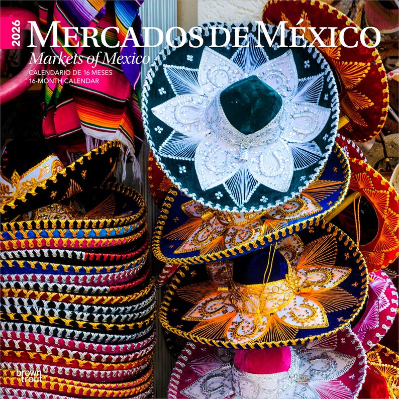 May include: A calendar titled "Mercados de M&eacute;xico" with a stack of colorful sombreros. The sombreros are in various colors, including black, blue, red, and green, with intricate embroidery and gold trim. The calendar also includes the text "Markets of Mexico" and "16-Month Calendar."