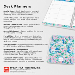 May include: A desk planner with a floral design. The planner is 6" x 7.75" and has 128 pages. The cover features a pattern of blue, pink, and white flowers. The planner is for the year 2026.
