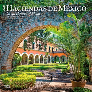 May include: A 2027 16-month calendar titled Haciendas de M&eacute;xico Great Houses of Mexico featuring a photograph of a stone archway framing a peach-colored building with arched corridors, a central fountain, and green landscaping in a courtyard.