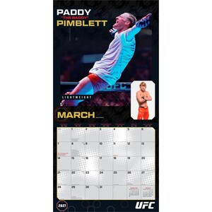 May include: A 2027 UFC wall calendar for the month of March featuring Paddy "The Baddy" Pimblett. The top section displays a large action photo of the fighter in a white shirt and red shorts, a smaller portrait, and the text "Paddy The Baddy Pimblett".