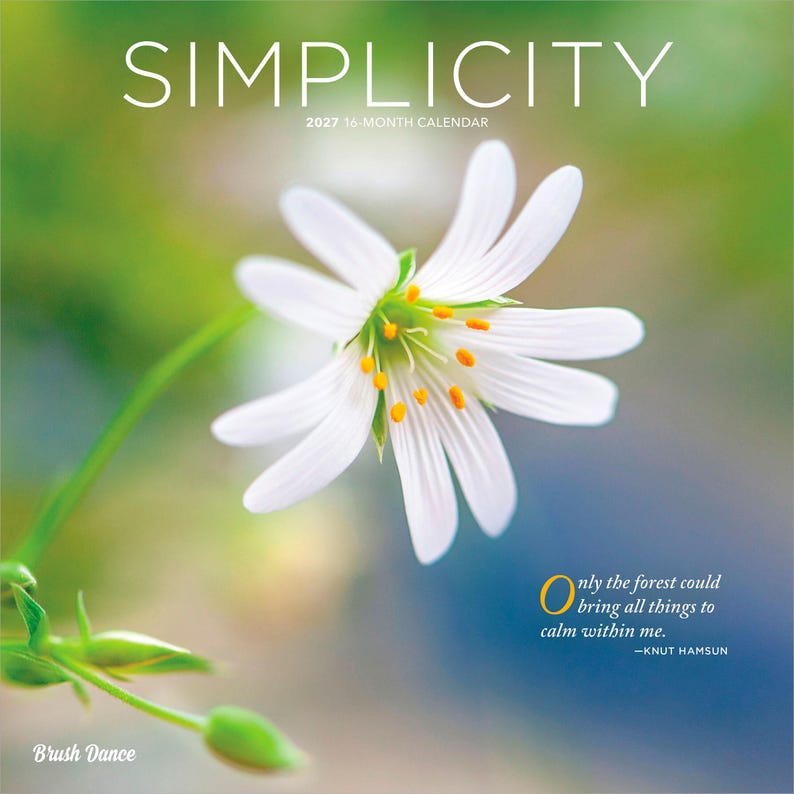 May include: A 2027 16-month calendar titled SIMPLICITY featuring a white flower with yellow centres against a blurred green and blue background. The text reads Only the forest could bring all things to calm within me and Brush Dance.