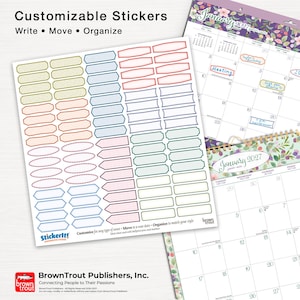 May include: A sheet of customisable stickers featuring various shapes and colours, including rectangular, oval, and arrow-like designs. The sheet includes the text Customisable Stickers, Write, Move, Organise, and Stickerit, alongside two 2027 wall calendars.