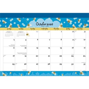 May include: A 2026 wall calendar with a blue and yellow bee theme. The calendar features the month of October, with the days of the week across the top. Decorative bees and honeycomb patterns adorn the borders.