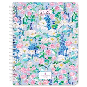 May include: A spiral-bound planner with a floral design. The cover features a light blue background with watercolor-style flowers in white, pink, and blue. The year "2026" is displayed in a rectangular box. The Turnowsky logo is at the bottom.