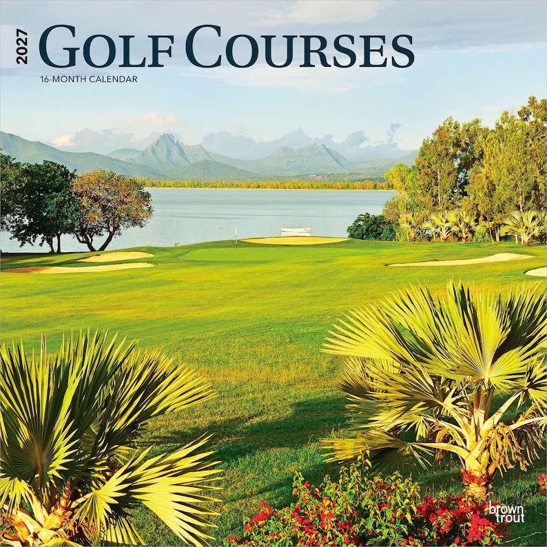 May include: A 2027 Golf Courses 16-month calendar featuring a landscape photograph of a green golf course with palm trees, sand bunkers, a lake, and distant mountains under a clear sky. The text 2027 GOLF COURSES 16-MONTH CALENDAR is printed at the top.