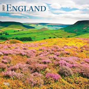 May include: A 2027 England 16-month calendar featuring a landscape photograph of rolling green hills and a vibrant foreground of pink and yellow heather under a blue sky with white clouds. The text 2027 ENGLAND 16-MONTH CALENDAR is printed at the top.