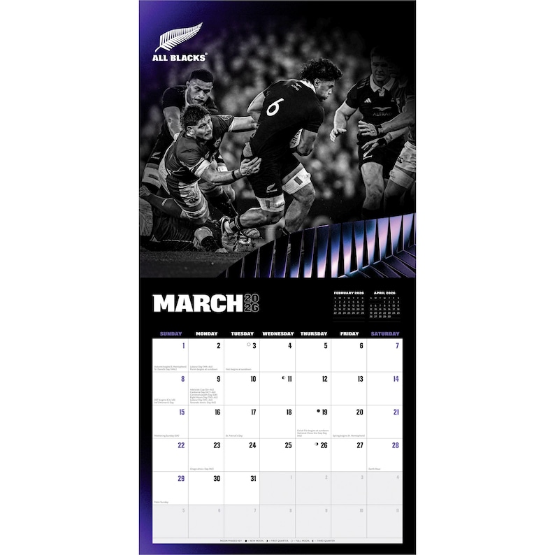 May include: A black and white calendar featuring a rugby match scene with players in action. The calendar displays the month of March 2026, with a schedule of days and dates. The All Blacks logo is at the top.