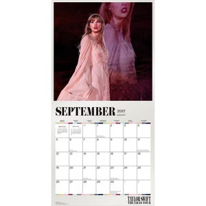 May include: A wall calendar for September 2027 featuring a photograph of a performer in a light pink, embellished gown. The calendar grid displays the month, year, and days of the week. The text reads September 2027 and Taylor Swift The Eras Tour.