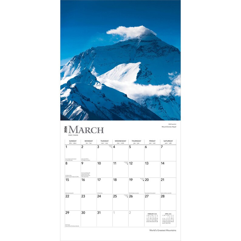 May include: A wall calendar featuring a photograph of a snow-covered mountain peak under a blue sky. The calendar is open to March 2026, with a grid of dates and days of the week. The text "World's Greatest Mountains" is at the bottom.