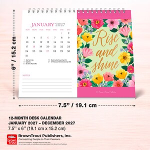 May include: A 12-month desk calendar for January 2027 measuring 7.5 inches by 6 inches. The left page shows the January calendar grid, while the right page features a floral border with the text Rise and shine in gold script lettering.
