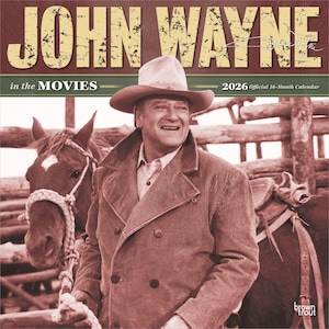 May include: A 2026 official 16-month calendar featuring John Wayne in the Movies. The calendar cover displays a sepia-toned image of John Wayne in a cowboy hat and coat, with a horse in the background. The text "JOHN WAYNE" is at the top.