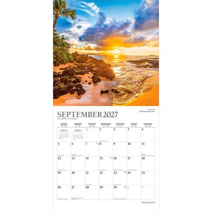 May include: A wall calendar for September 2027 featuring a photograph of a tropical beach at sunset with dark volcanic rocks, golden sand, and a palm tree. The calendar grid displays the month, year, and days of the week in black text.