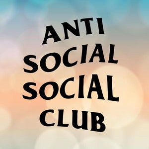 May include: Black and white graphic design with the text "ANTI SOCIAL SOCIAL CLUB" in a bold, stylized font. The design is set against a blurred background of orange, pink, and blue.