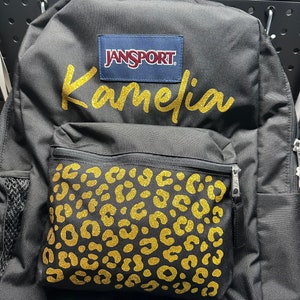Leopard jansport backpack best sale