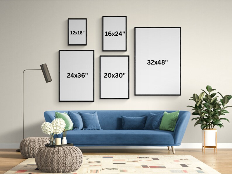 May include: A living room interior with a blue sofa, two knitted ottomans, a floor lamp, a potted plant, and a white rug. Five black picture frames are hung on the wall with the following dimensions: 12x18 inches, 16x24 inches, 24x36 inches, 20x30 inches, and 32x48 inches.