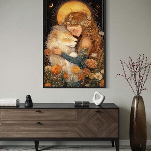 May include: A painting of a woman with long red hair embracing a lion. The woman is wearing a floral crown and a blue dress. The lion is white with a golden mane. The background is a dark forest with a full moon and stars.