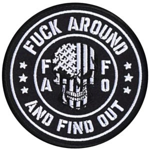 May include: Black and white embroidered patch with a skull wearing an American flag bandana. The text around the skull reads "F**k Around And Find Out".
