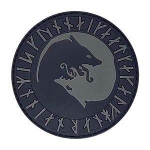 May include: A black and gray circular patch with a wolf and a stylized flame design. The patch is surrounded by a circle of runes.