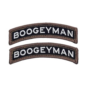 May include: Two brown and black embroidered patches with the text "BOGEYMAN" in white lettering.