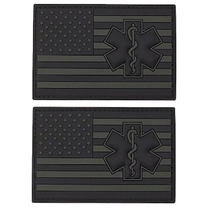 May include: Two black and green embroidered patches with the American flag and the Star of Life medical symbol.