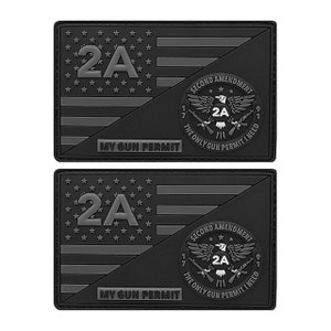 May include: Two black and gray patches with an American flag design. The patches feature the text "2A" and "My Gun Permit". The second patch also features a circle with the text "Second Amendment" and "The Only Gun Permit I Need".