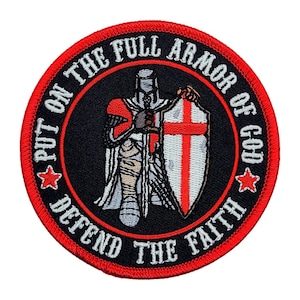 May include: Round embroidered patch with a red border and the text "PUT ON THE FULL ARMOR OF GOD DEFEND THE FAITH." The patch features a knight in silver armor holding a sword and shield with a red cross on a white background.