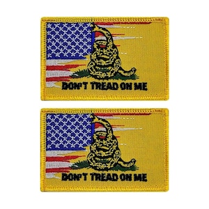 May include: Two yellow embroidered patches with a Gadsden flag design. The flag features a coiled rattlesnake with the words "Don't Tread On Me" below it. The flag is superimposed on a blue and red American flag.