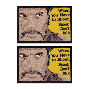May include: Two embroidered patches featuring a cartoon man with a mustache and the text "When You Have to Shoot, Shoot, Don't Talk".