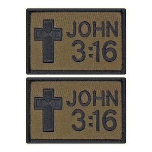 May include: Two olive green fabric patches with black stitching. Each patch features a black cross and the text "JOHN 3:16".