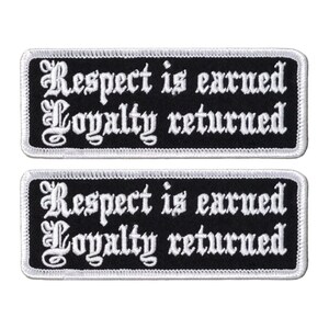May include: Two black and white embroidered patches with white stitching. The patches are rectangular and have the text "Respect is earned Loyalty returned" in a white gothic font.