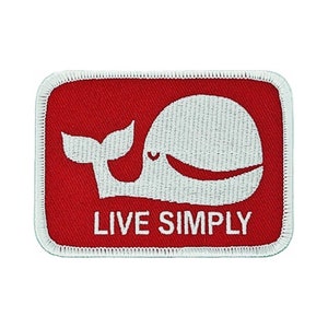 May include: Red embroidered patch with a white whale and the text "LIVE SIMPLY".