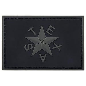 May include: Black and gray embroidered patch with a five-pointed star and the letters "TEXAS" surrounding the star.