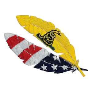 May include: Two embroidered feather patches. One features the American flag design in red, white, and blue. The other is yellow with a green and black snake and the words "Don't Tread on Me".