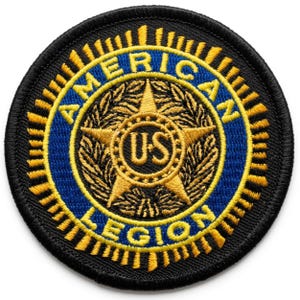 May include: Embroidered patch with the words "AMERICAN LEGION" in yellow lettering on a black background. The patch features a blue circle with a gold star and the letters "US" in the center. Gold laurel leaves surround the star.