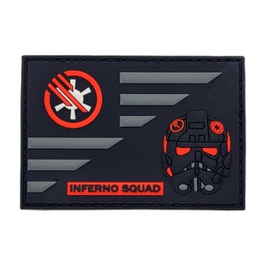 May include: Black and red embroidered patch with a stylized symbol and a helmet design. The text "Inferno Squad" is printed below the design.