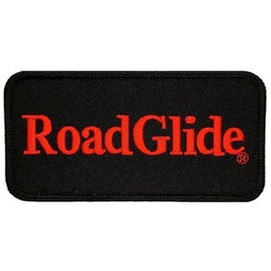 May include: Black embroidered patch with the red text "Road Glide" on a black background.
