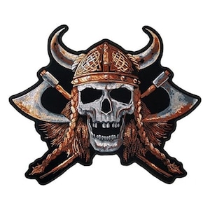 May include: A black and brown embroidered patch featuring a skull wearing a horned helmet with crossed axes behind it.
