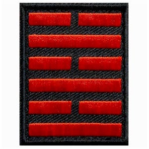 May include: A black patch with a red five-barred gate symbol. The symbol is a traditional Chinese symbol representing good fortune and prosperity.