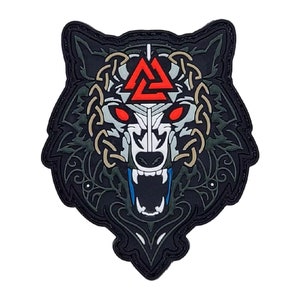 May include: Black and white wolf head with a red triangular symbol in the center. The wolf's eyes are red and the symbol is surrounded by a gold-colored design.