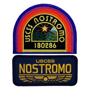 May include: Two embroidered patches featuring the Nostromo spacecraft from the movie Alien. The top patch is a circular design with a rainbow border and the text "USCSS NOSTROMO 180286". The bottom patch is a rectangular design with the text "USCSS NOSTROMO" and a stylized wing design.