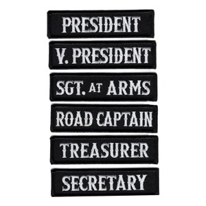 May include: Six black embroidered patches with white lettering. The patches read: President, V. President, Sgt. at Arms, Road Captain, Treasurer, and Secretary.
