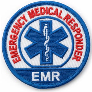 May include: A circular patch with a blue border and white center. The words "EMERGENCY MEDICAL RESPONDER" are in red around the edge. A blue star of life symbol is in the center, with a white staff of Asclepius. The letters "EMR" are at the bottom.