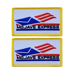 May include: Two yellow-bordered white patches with a blue and red stylized airplane design and the text "Mojave Express" in black.
