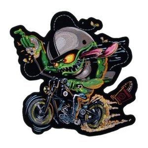 May include: Embroidered patch featuring a green goblin riding a black motorcycle. The goblin wears a gray helmet and has yellow eyes. The motorcycle has a number 8 on the side. The patch has a black background with a white stitched border.