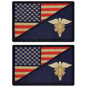 May include: Two embroidered patches with a diagonal American flag design. The top half of the patch is a blue background with a gold medical symbol. The bottom half of the patch is a red, white, and blue American flag.