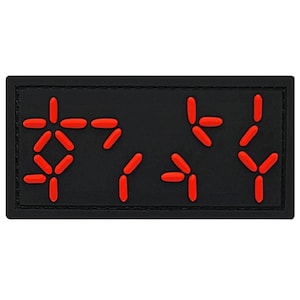 May include: Black patch with red embroidered symbols, resembling a digital display showing the numbers "0714".